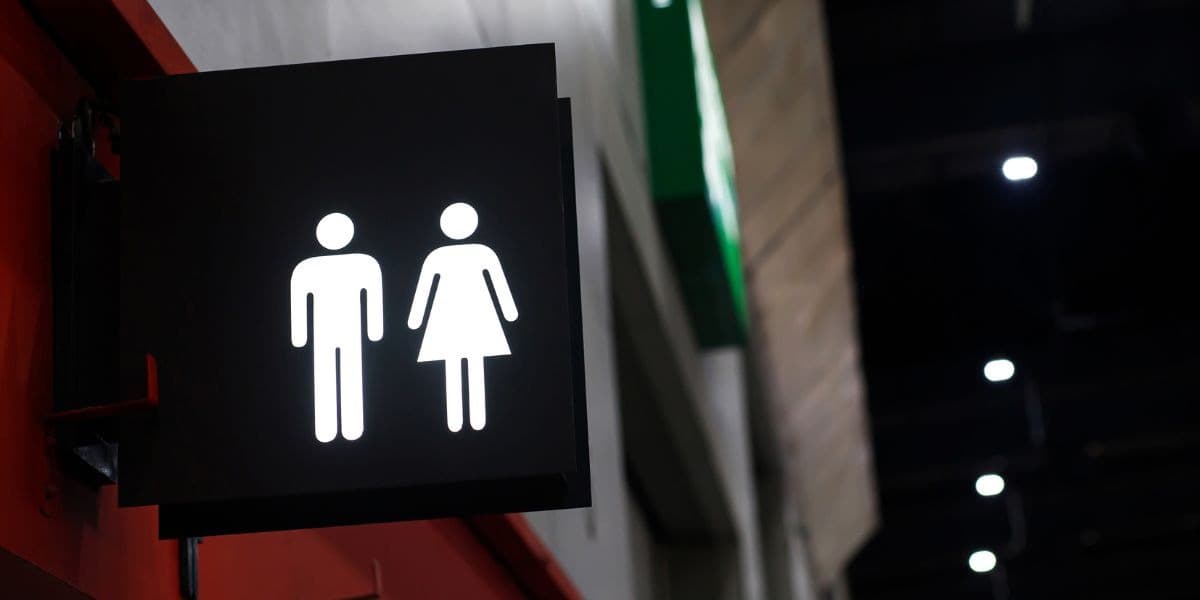 A restroom sign outside a facility in Mongolia